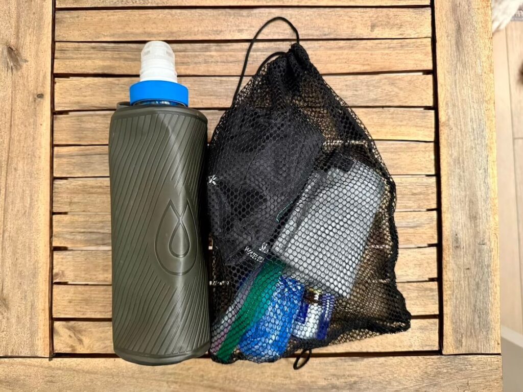 Jeff’s backpacking water filtration and carry system, including the HydraPak Flux bottle and net bag, designed for ultralight backpacking efficiency.