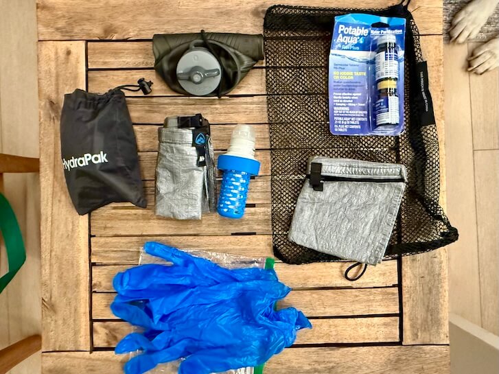 My trusted backpacking water filtration and carry system includes the Katadyn BeFree filter, HydraPak Flux 1L bottle, HydraPak Seeker 4L water storage bottle, and Zpacks Dyneema Medium Dry Bag. Lightweight and efficient, they integrate seamlessly for water collection, storage, and filtration while protecting my gear from leaks or the reservoirs from punctures.